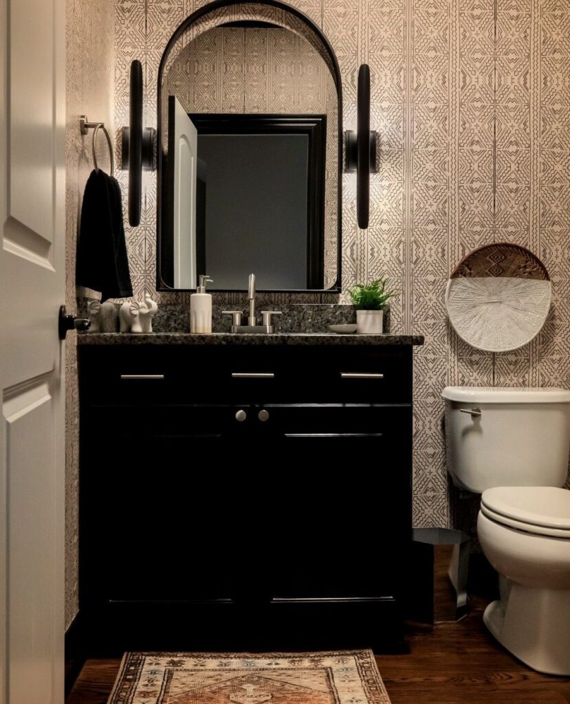 Bold & Chic Black Vanity Bathroom with Patterned Flair

