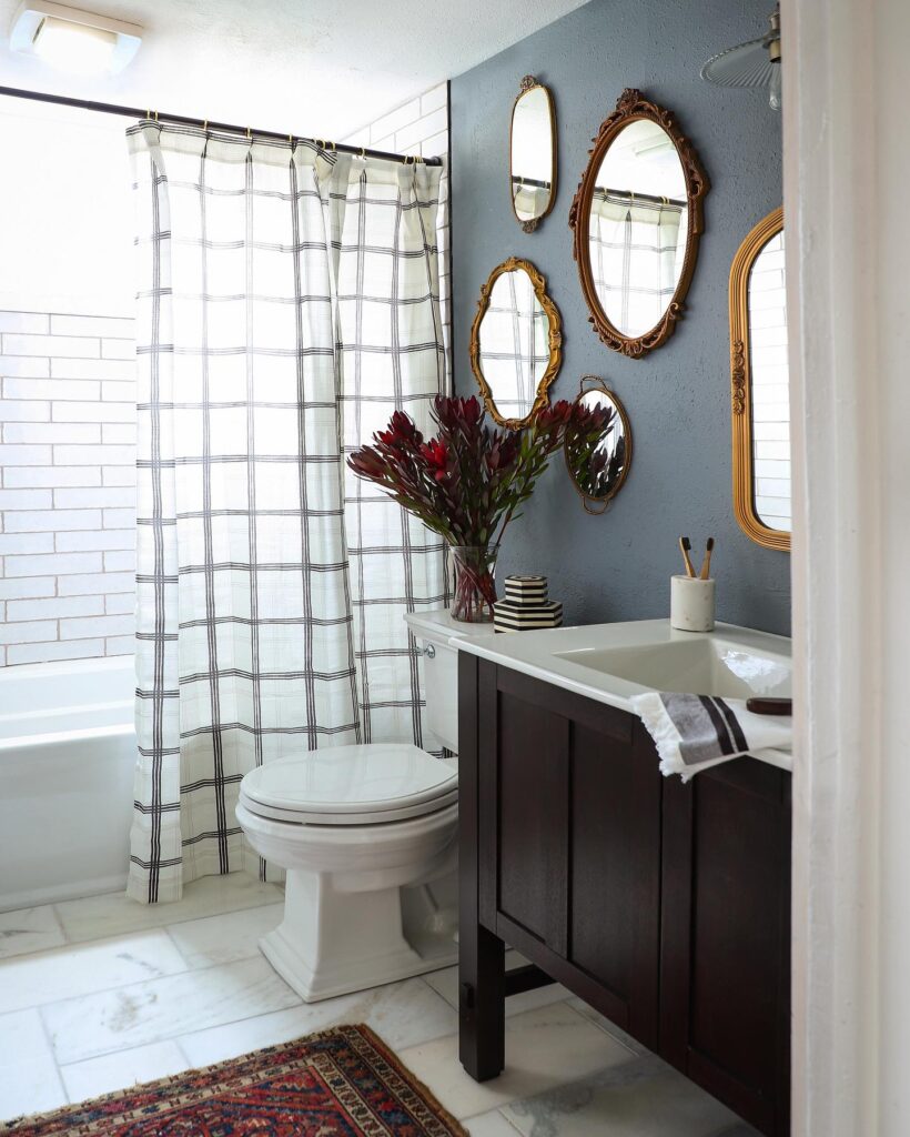 Eclectic Vintage Bathroom with Bold Accents
