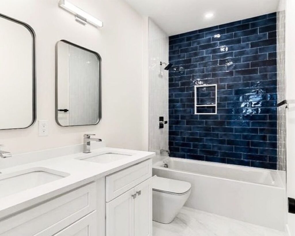 Elegant Contrast Navy Blue and White Bathroom Design
