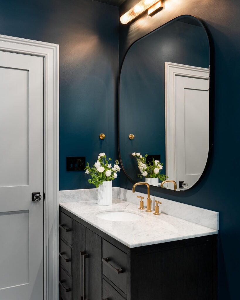 Moody Elegance Dark Blue Vanity with Gold Accents
