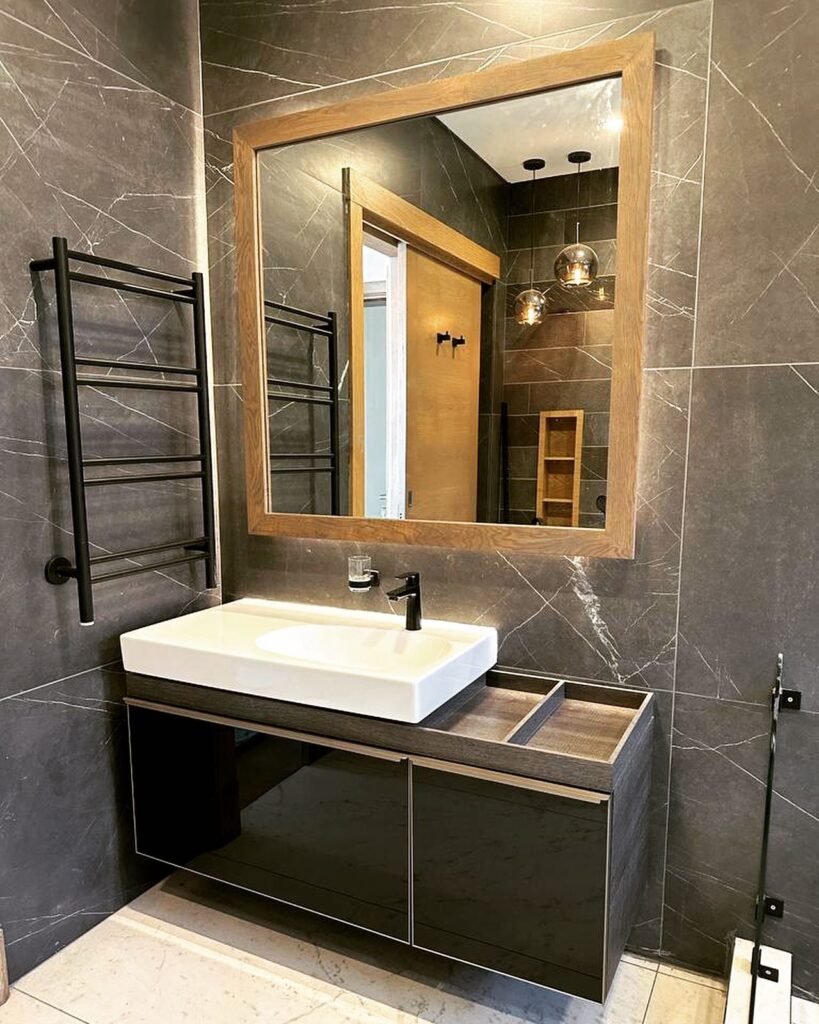 Sleek and Sophisticated Dark Stone Elegance Meets Minimalist Warmth

