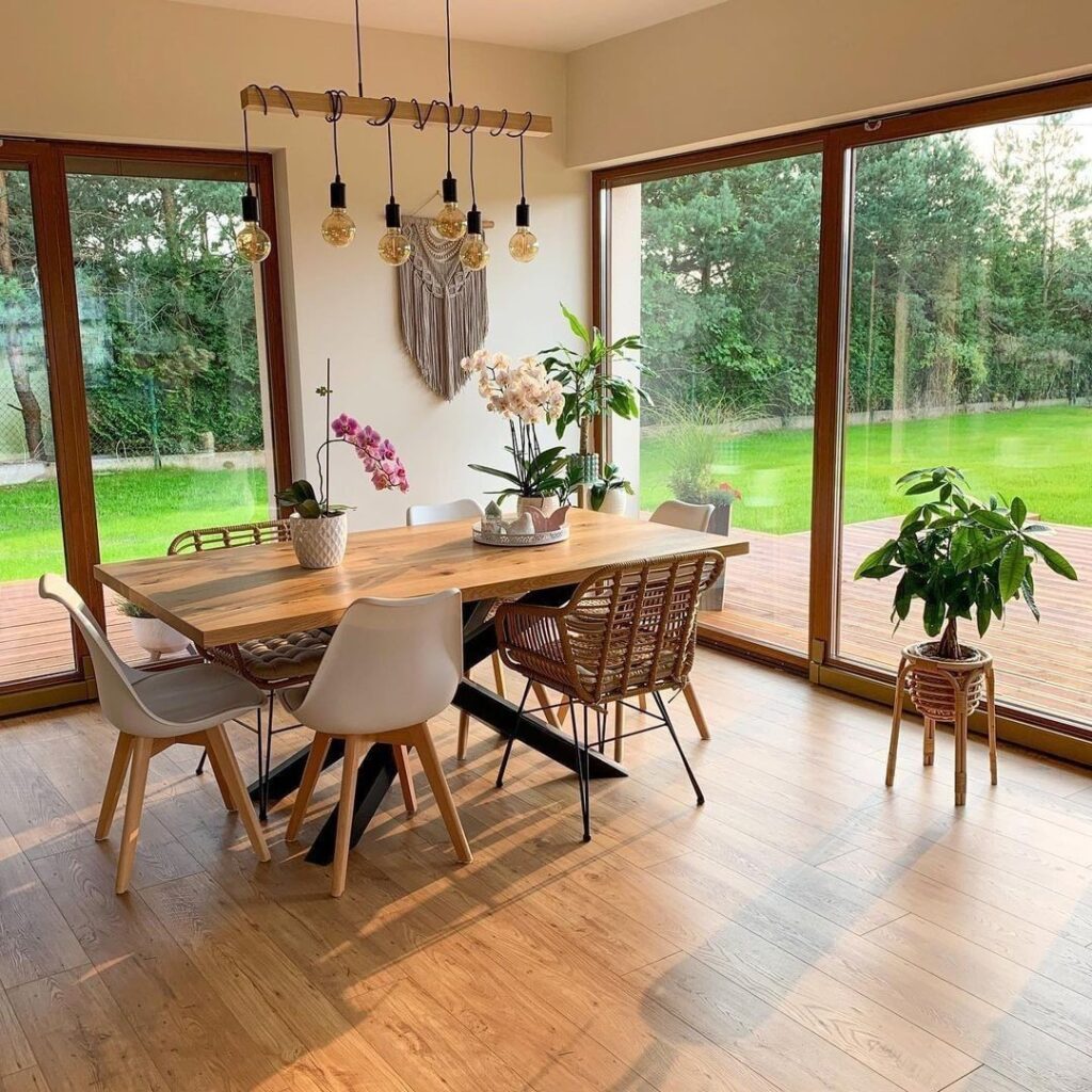 Bright Dining Room with Garden Views and Natural Accents

