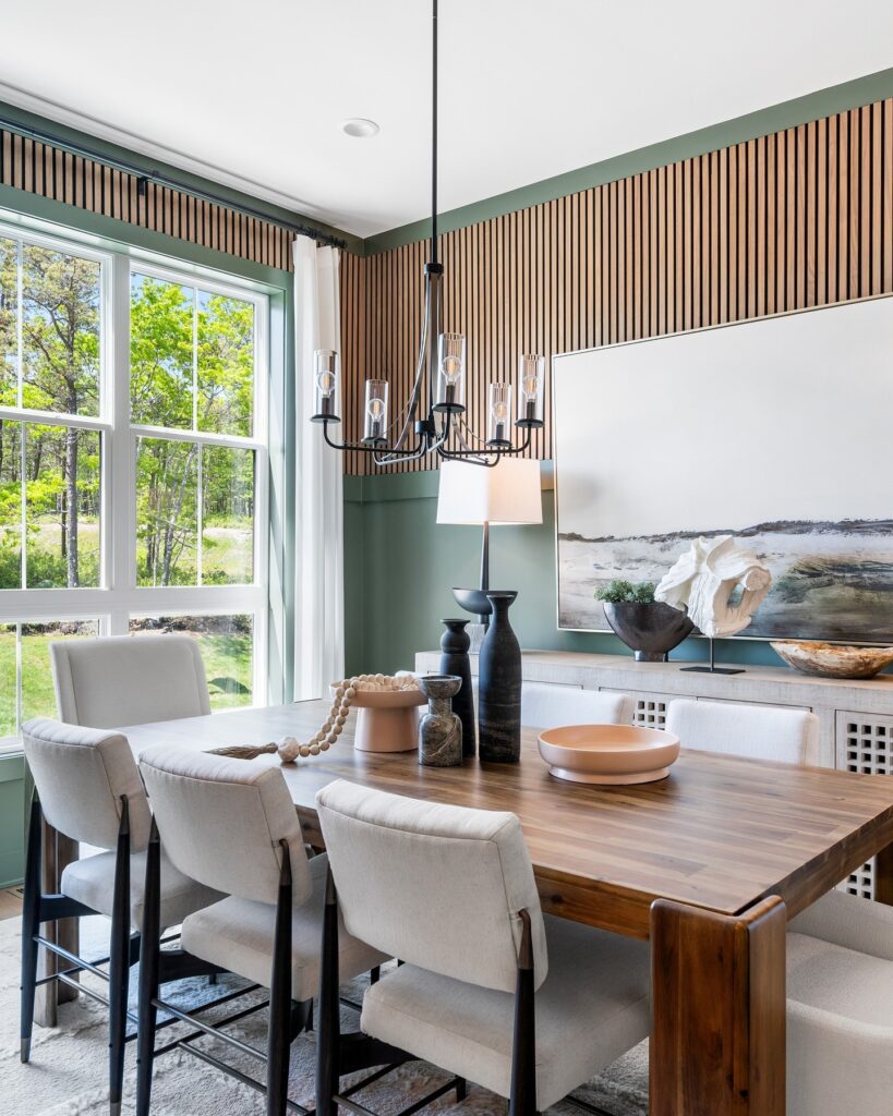 Bright Dining Room with Natural Wood and Green Accents

