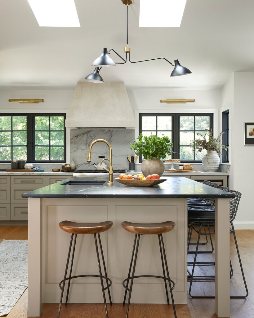 Bright Kitchen Island Dining with Modern Lighting
