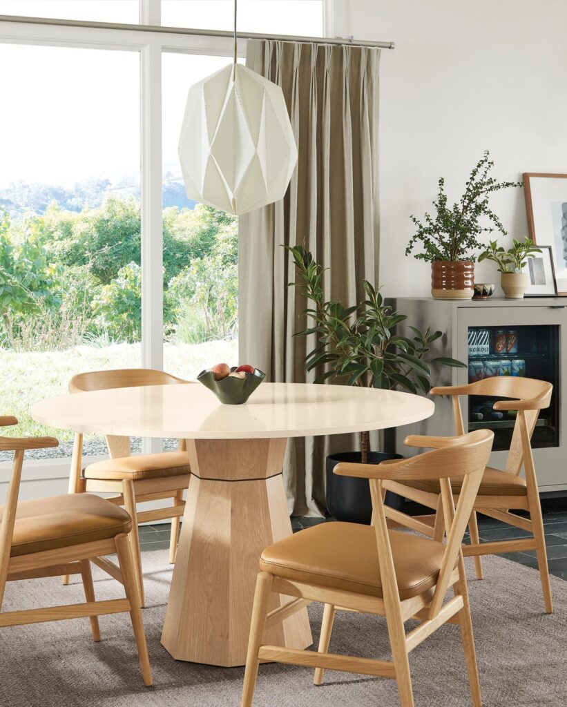 Bright and Airy Round Dining Space
