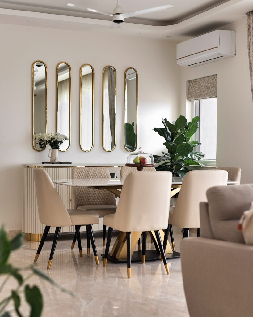 Bright and Contemporary Dining Area with Mirrored Accents

