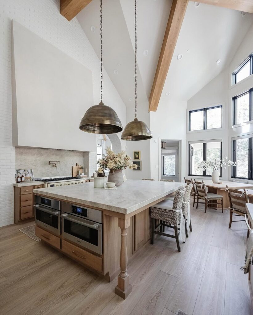 Bright and Expansive Modern Farmhouse Kitchen with Island Seating

