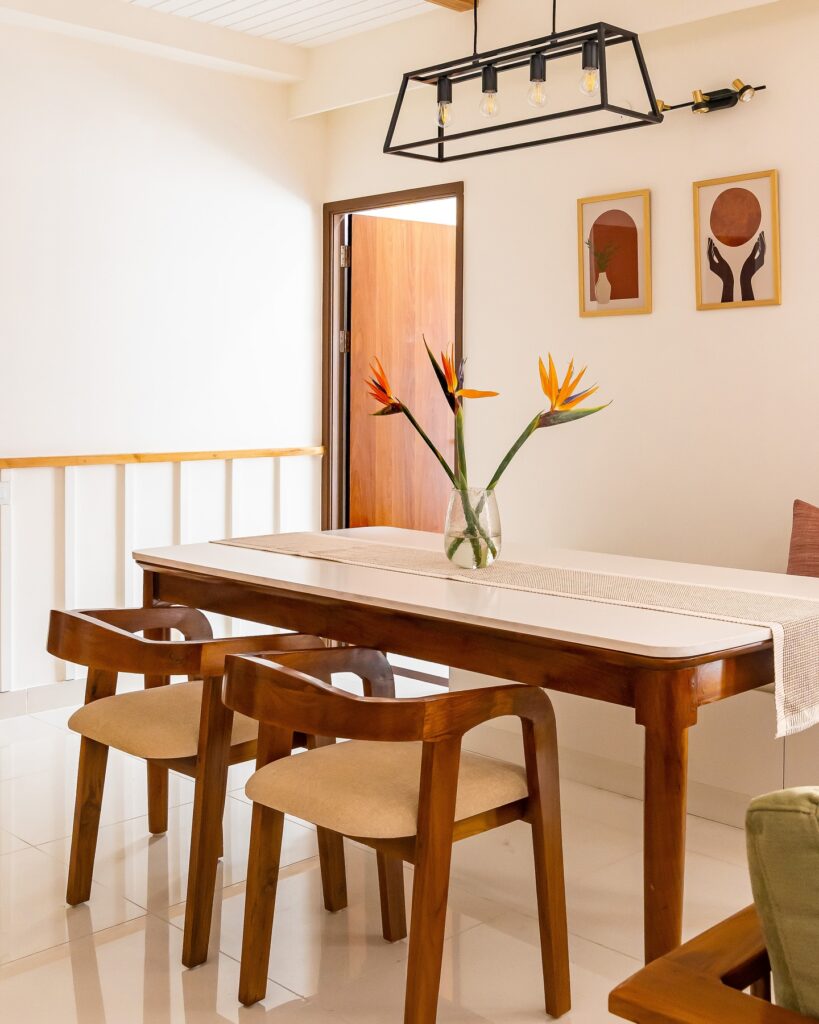 Bright and Minimalist Dining Area with Artistic Touches

