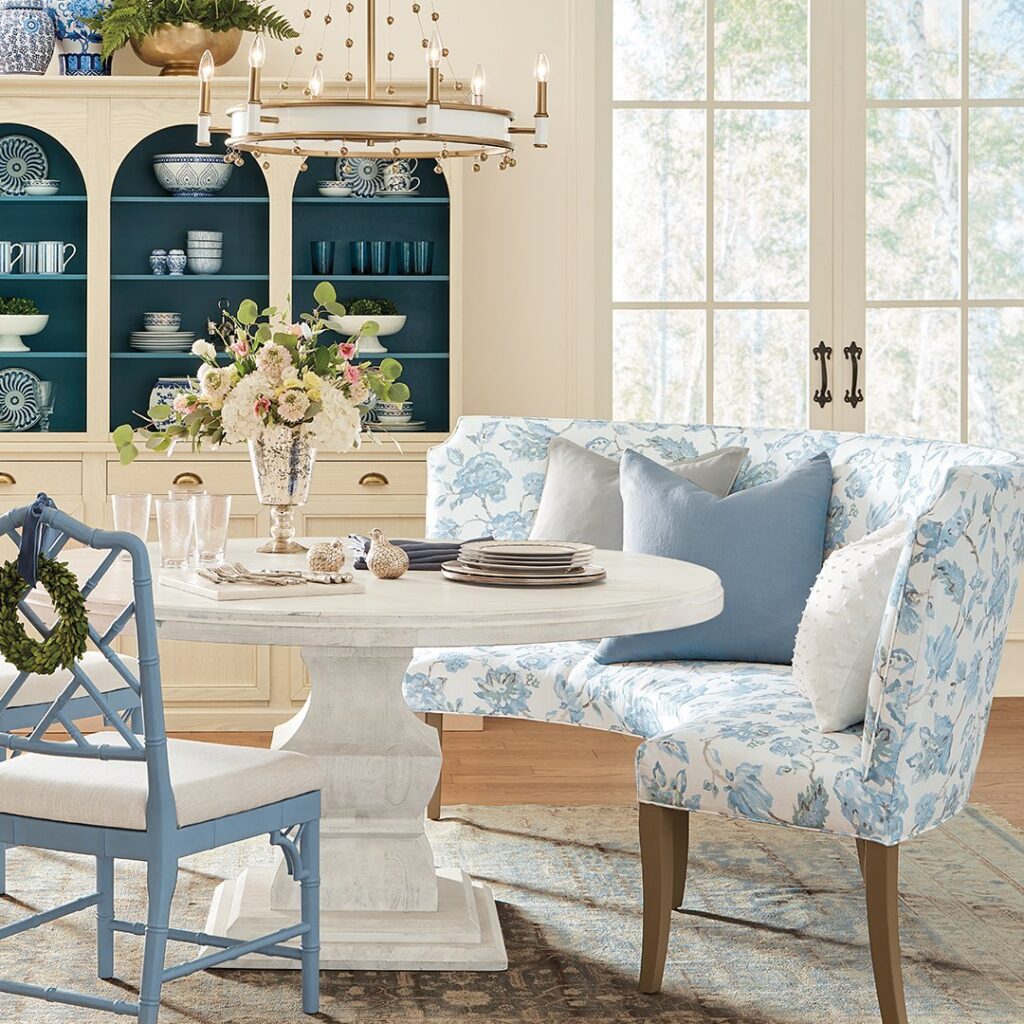 Charming Coastal Dining Nook with Floral Banquette

