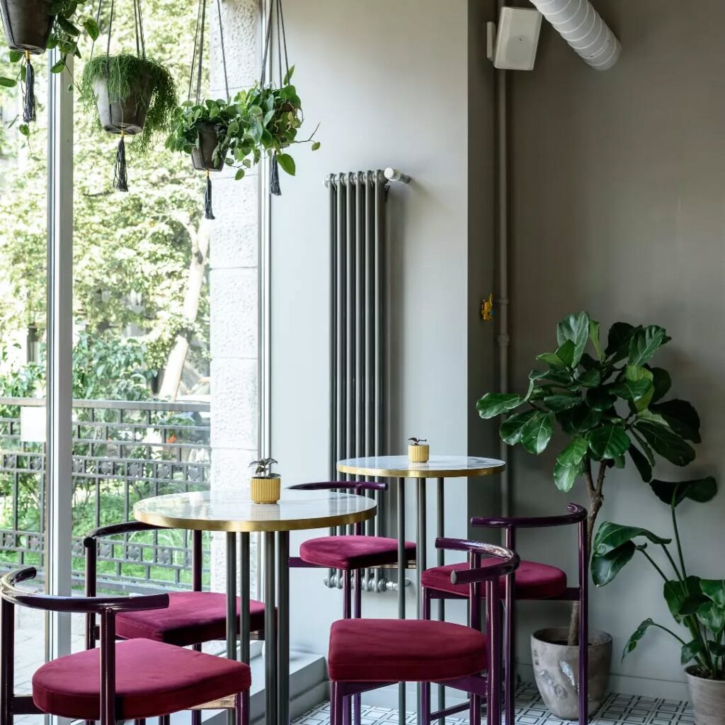 Chic Cafe Corner with Lush Greenery

