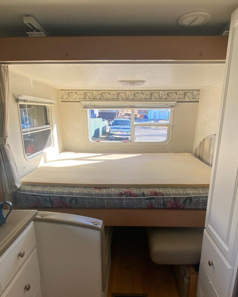 Compact Camper Sleeping and Storage Area

