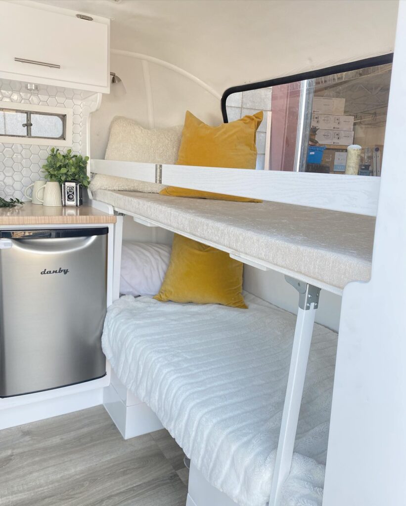 Compact and Clever Bunk Bed Setup in a Small Camper

