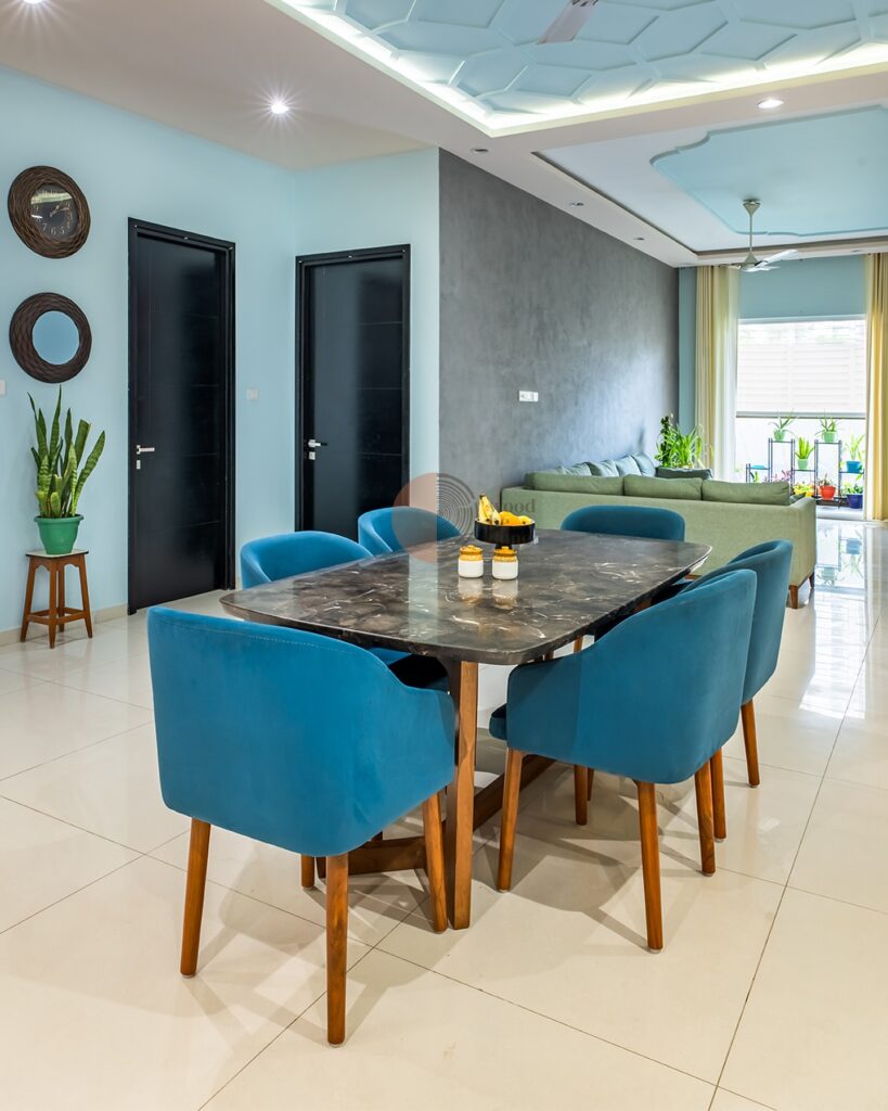 Contemporary Open-Plan Dining Area with Teal Accents

