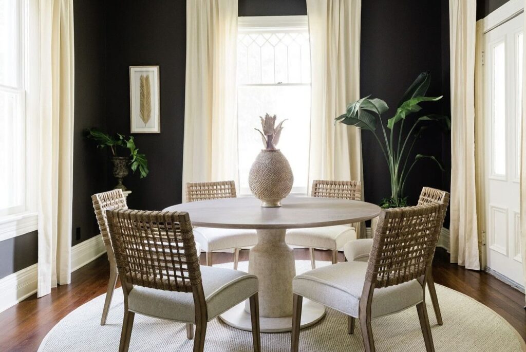 Elegant Dark Dining Room with Natural Accents
