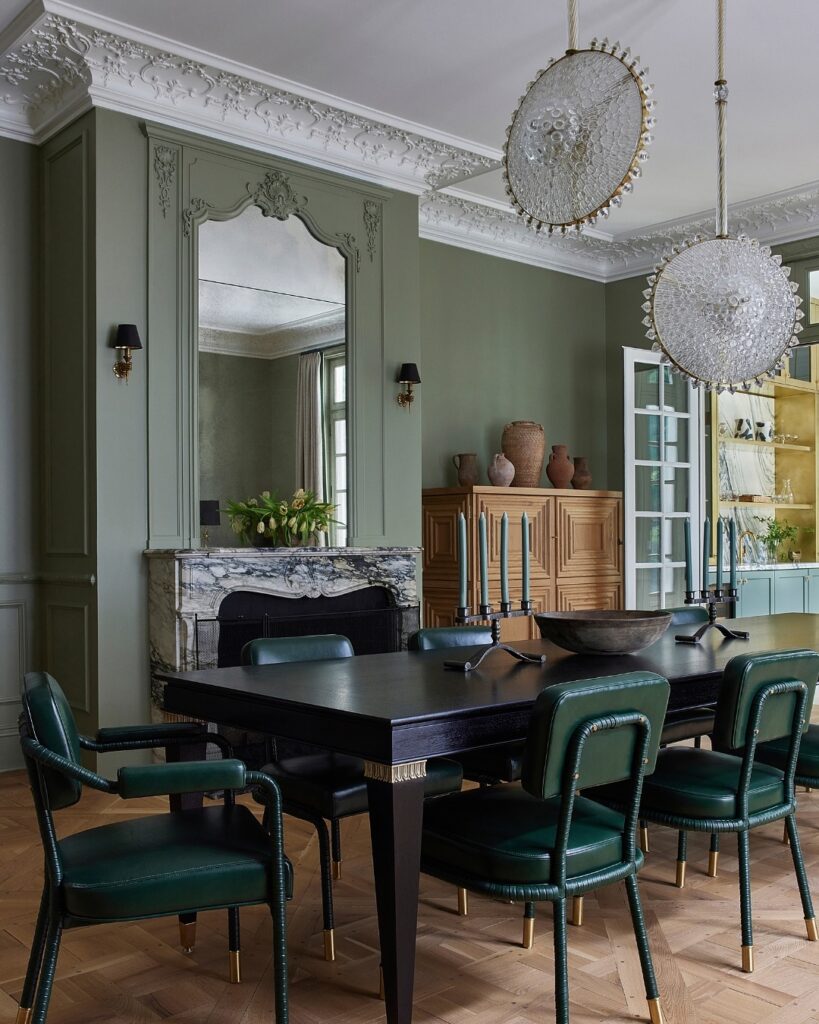 Elegant Green Dining Room with Ornate Details

