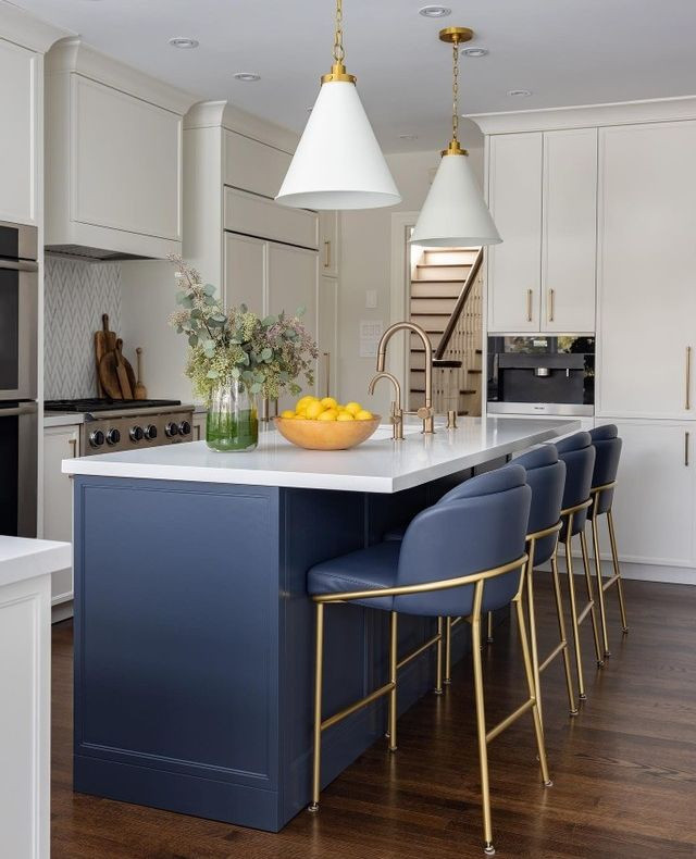 Elegant Kitchen Island with Blue Base and Gold Accents

