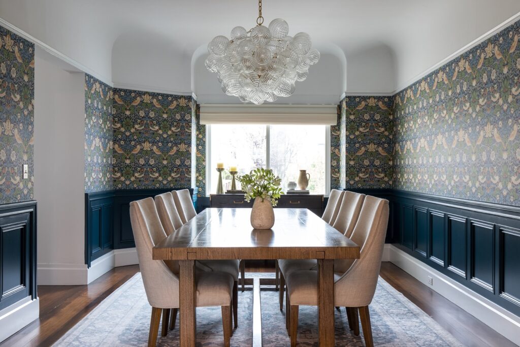 Elegant Traditional Dining with Patterned Walls

