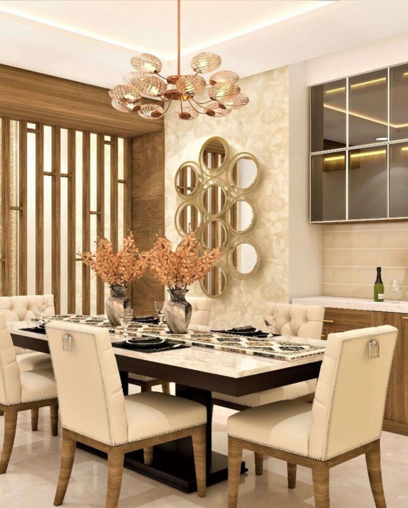 Elegant and Contemporary Dining Area with Statement Lighting

