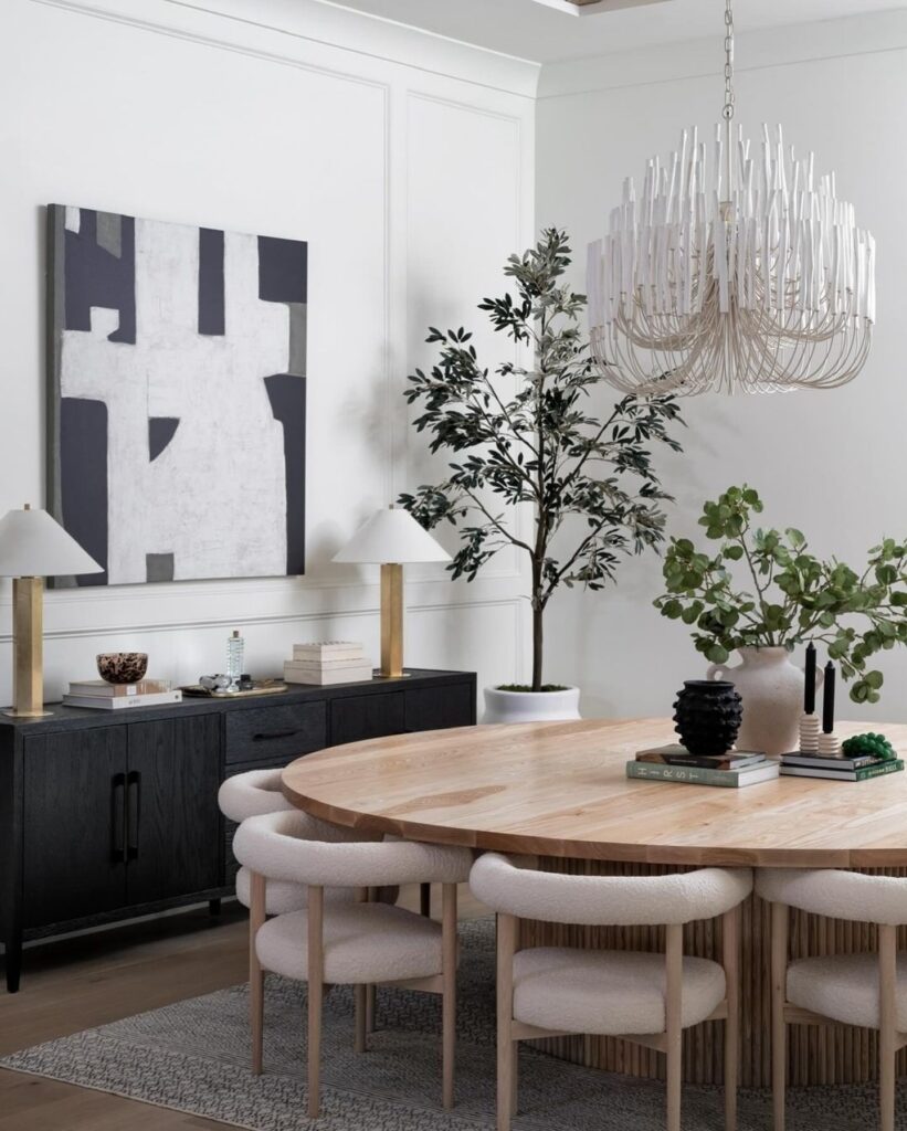 Elegant and Modern Dining Room with Sculptural Chandelier

