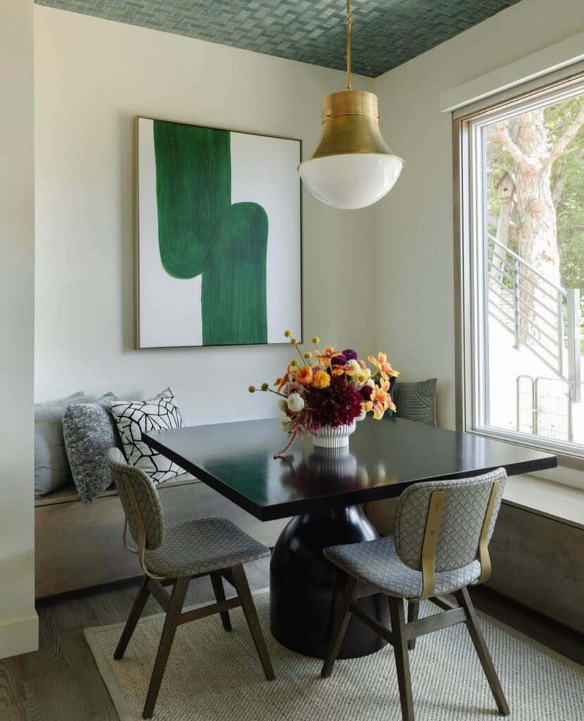 Modern Dining Nook with Bold Green Accents

