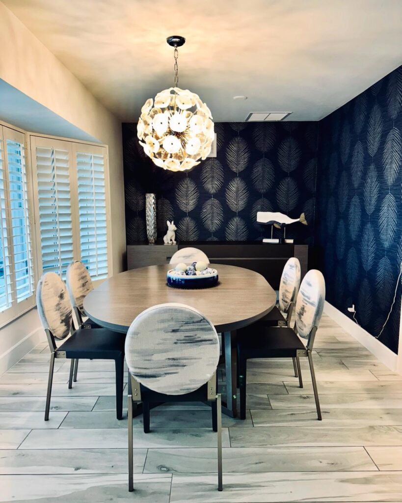 Modern Dining Room with Bold Wallpaper Accent

