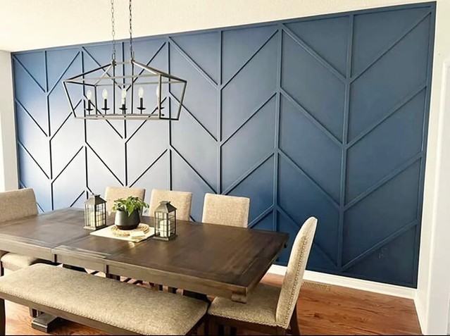 Modern Dining Room with Geometric Accent Wall


