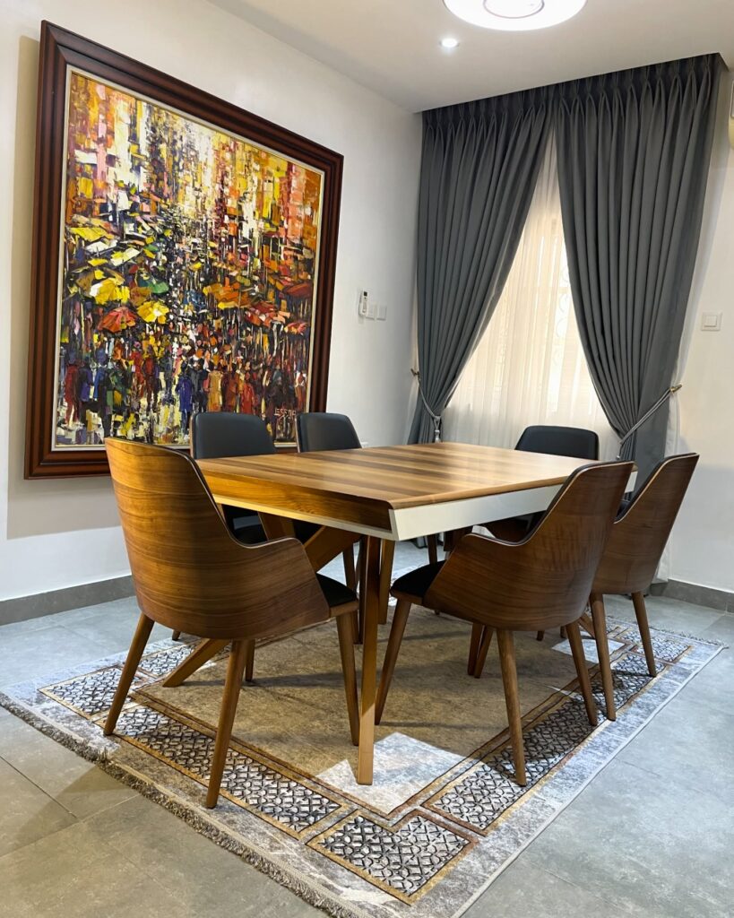 Modern Dining Room with Vibrant Cityscape Art

