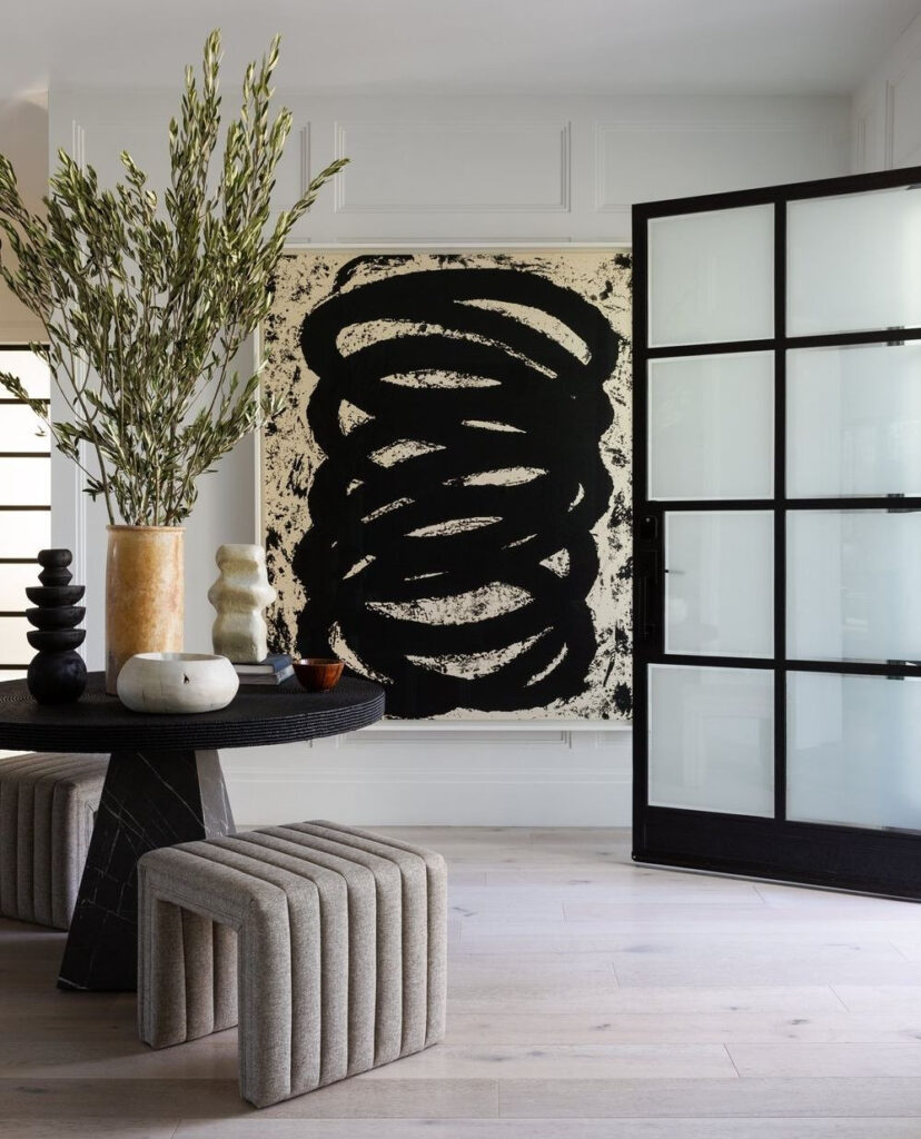 Modern Entryway with Bold Art and Sculptural Elements

