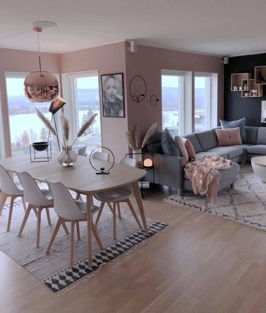Modern Open-Plan Living and Dining Area with Soft Pink Accents


