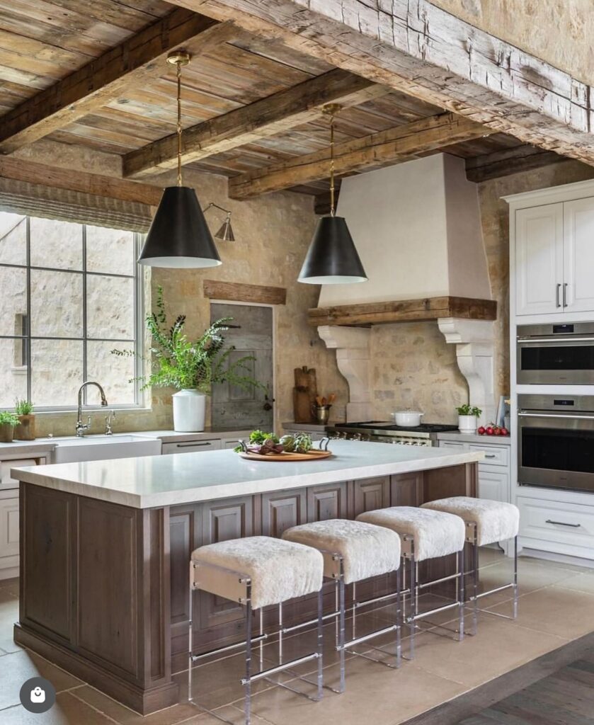 Rustic Farmhouse Kitchen Island with Industrial Pendants

