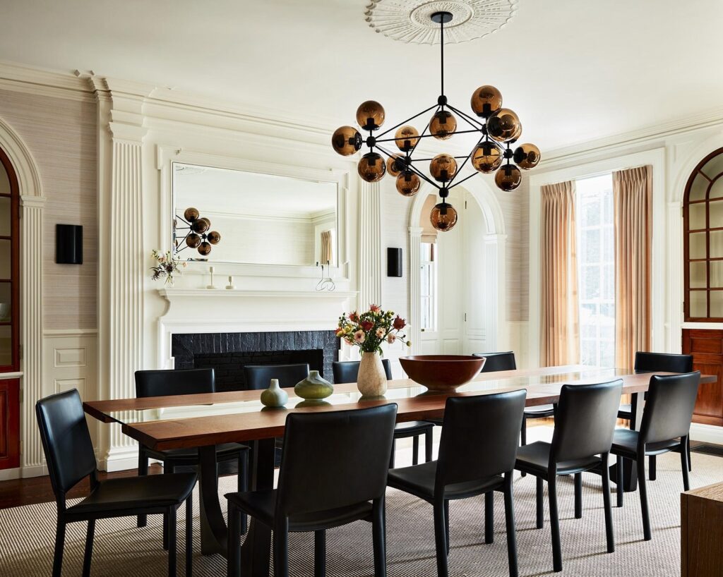 Sophisticated Dining Room with Statement Lighting

