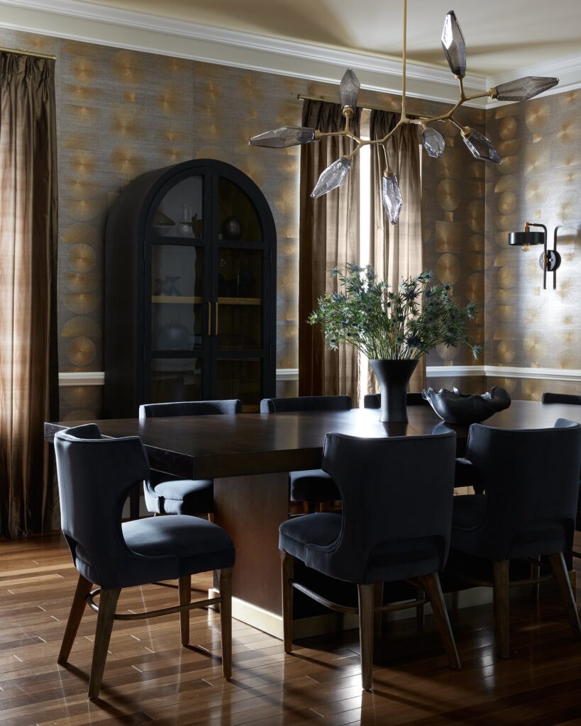 Sophisticated and Moody Dining Room with Artistic Lighting

