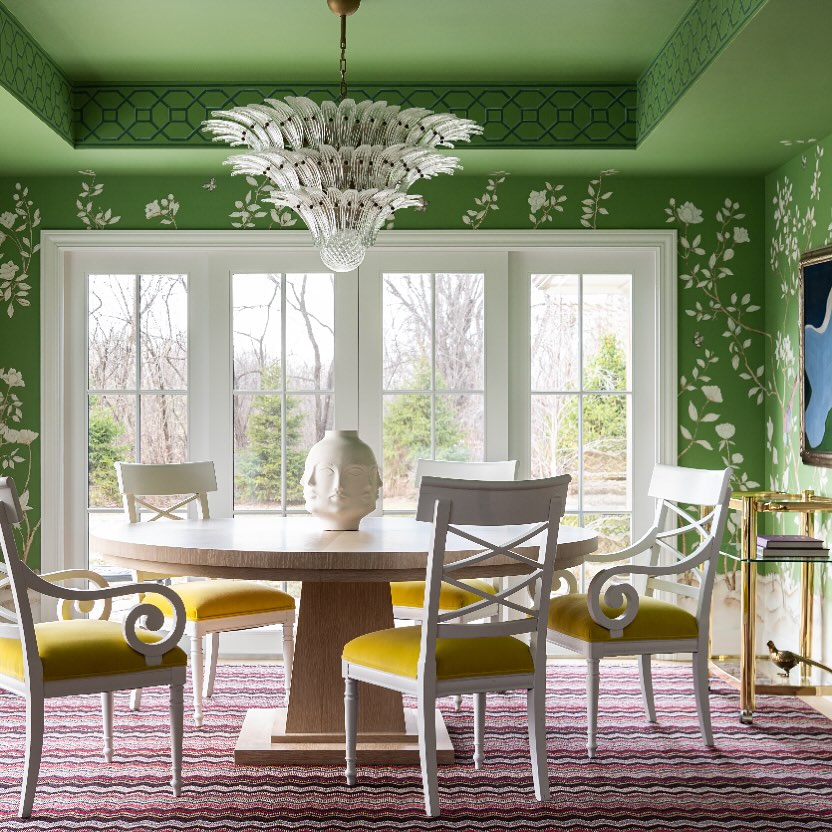 Vibrant Green Dining Room with Whimsical Chandelier

