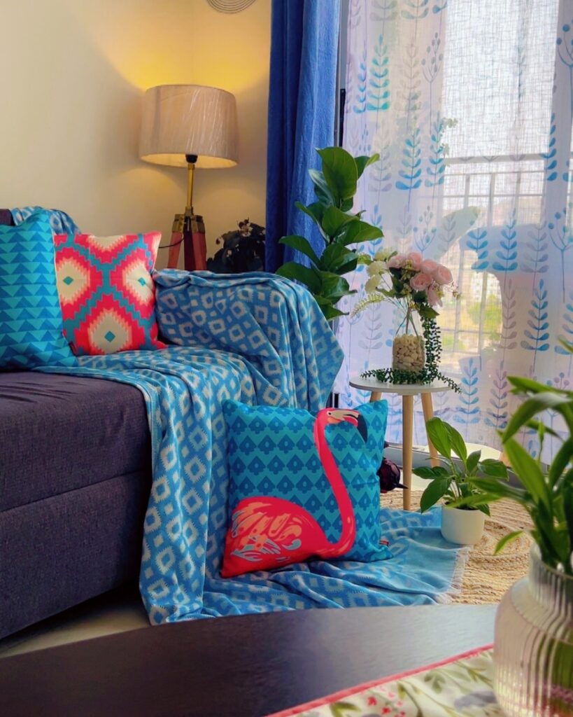 Vibrant and Cozy Corner with Blue Accents

