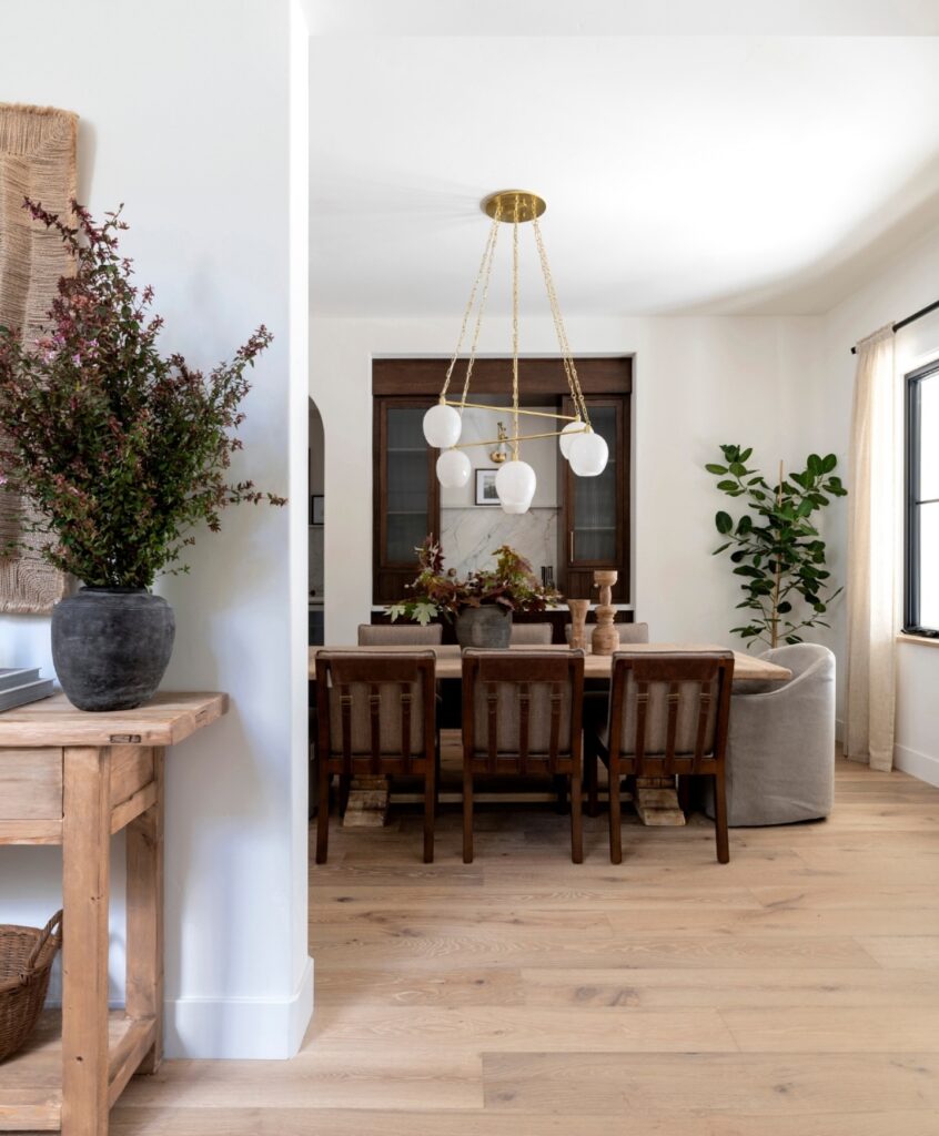Warm and Inviting Dining Room with Modern Chandelier

