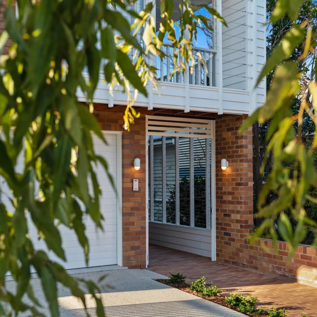 Brick and White A Modern Home with a Welcoming Entrance
