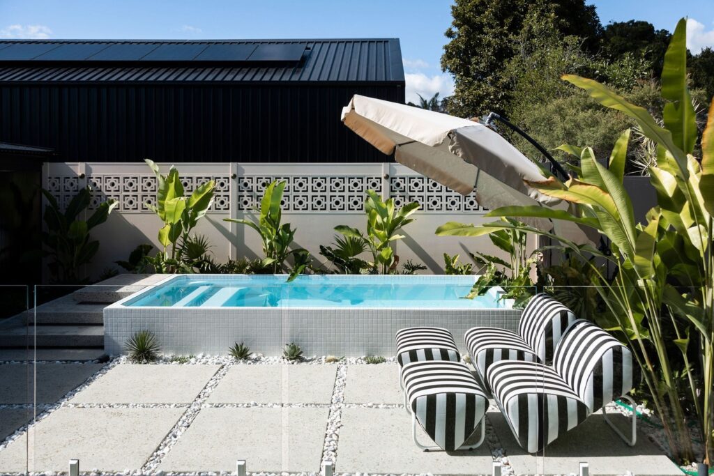 Chic Plunge Pool with Striped Accents
