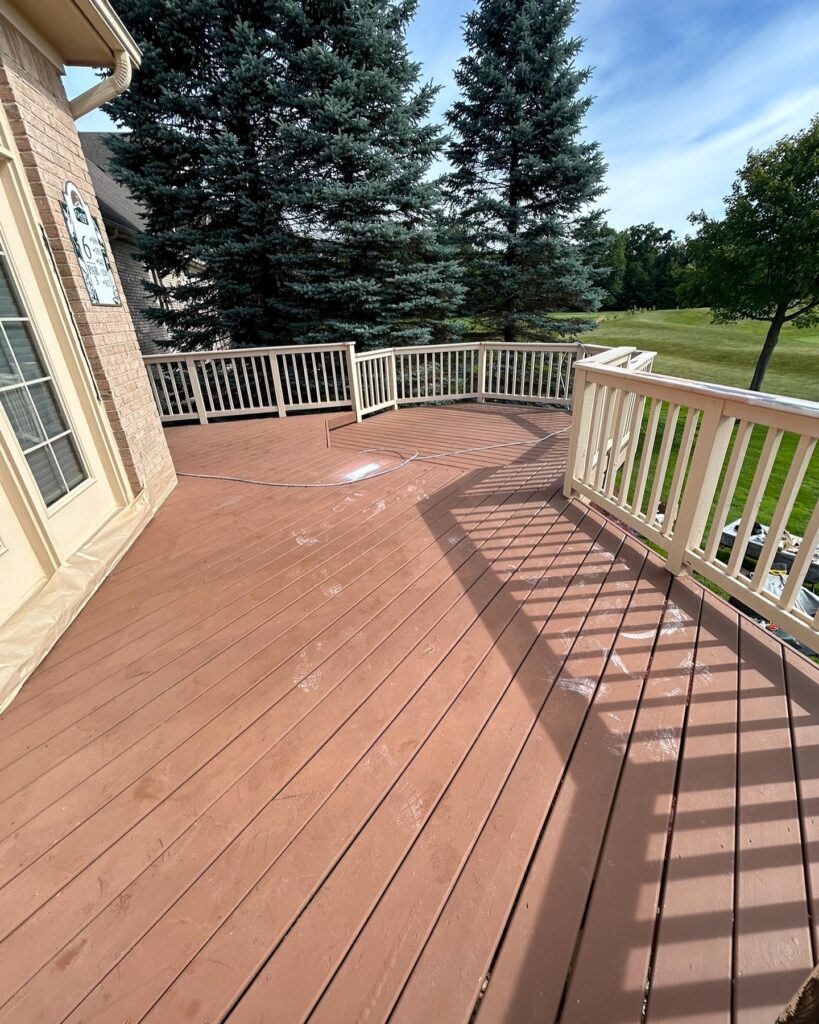 Deck with Warm Brown Stain and White Railing
