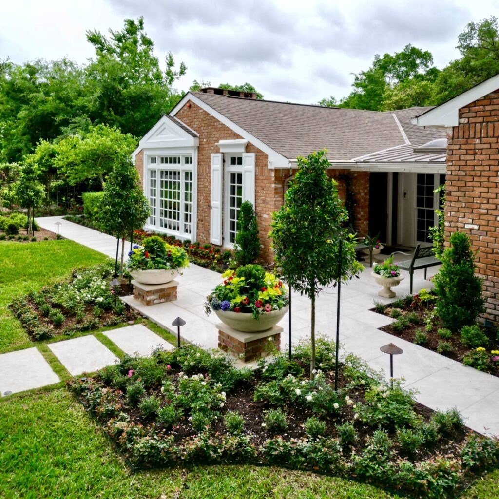 Formal Front Yard Flower Beds with Potted Accents
