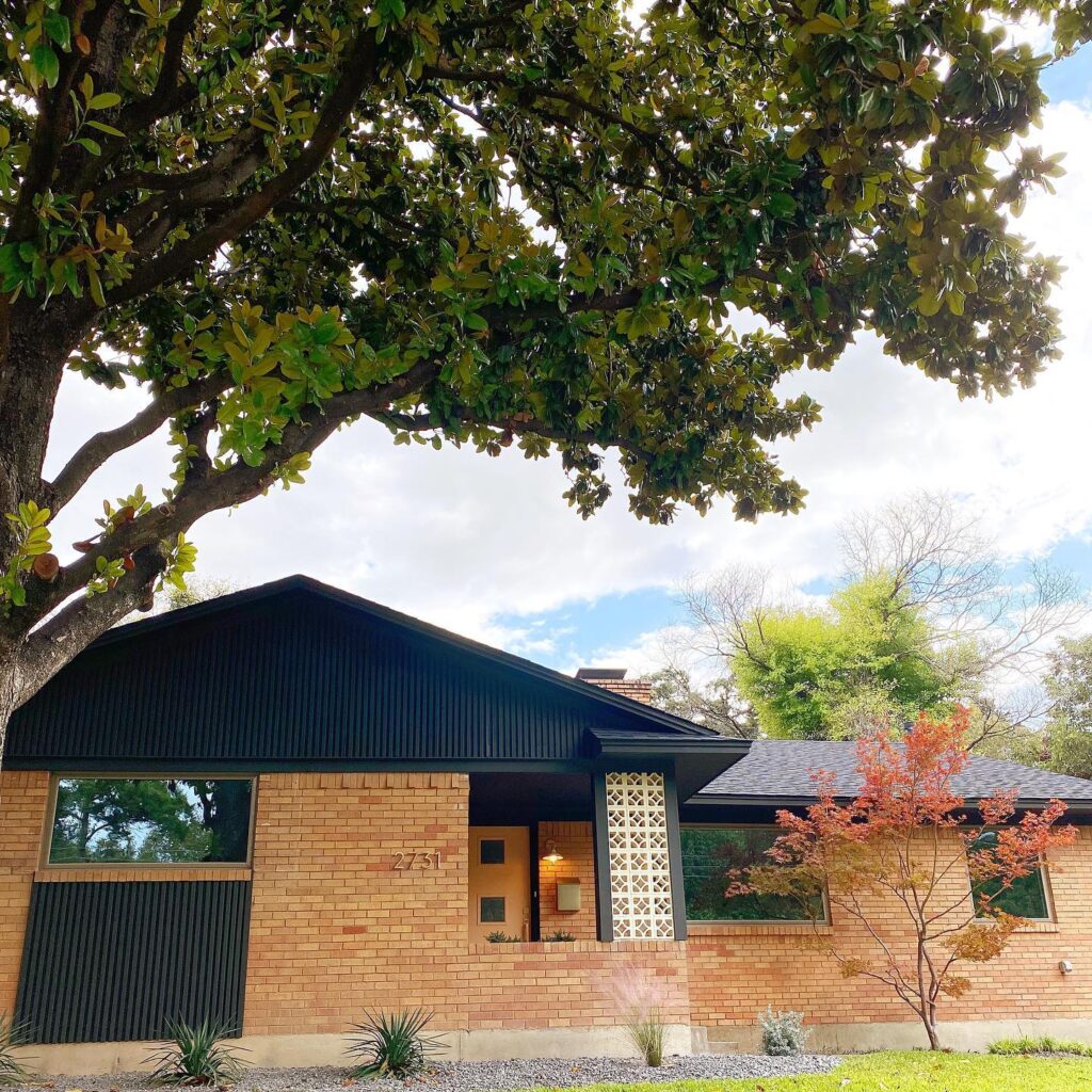 Modern Brick Ranch House with Black Accents
