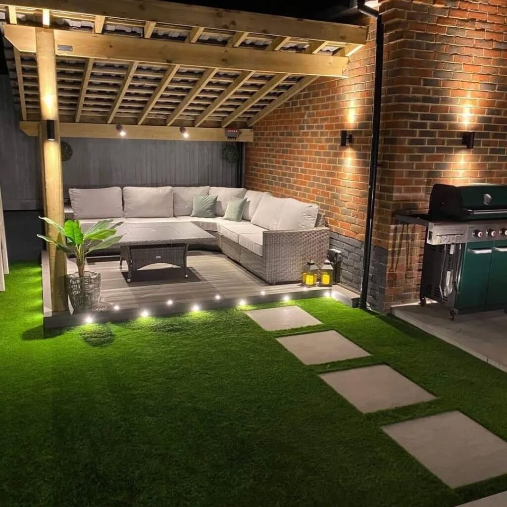 Modern Covered Patio Artificial Grass and Cozy Seating
