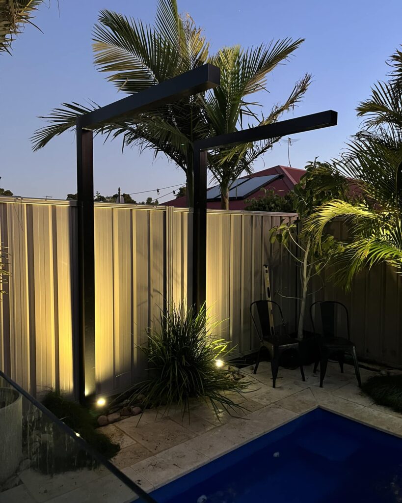 Modern Patio with Illuminated Pergola
