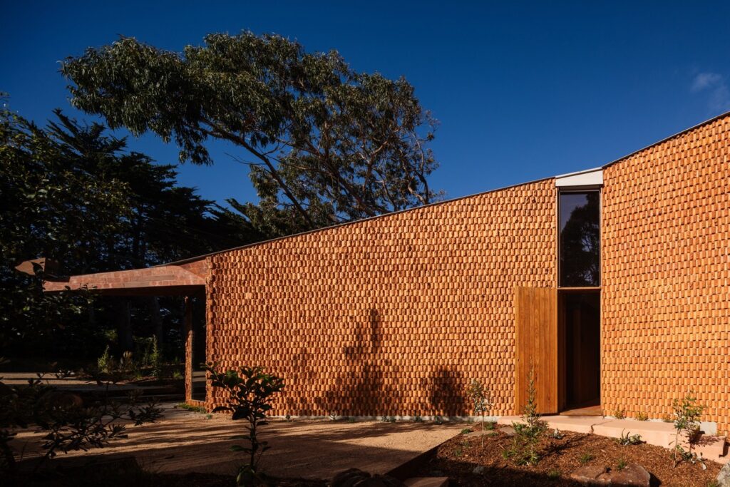 Sculpted Terracotta A Modern Home with Artistic Brickwork
