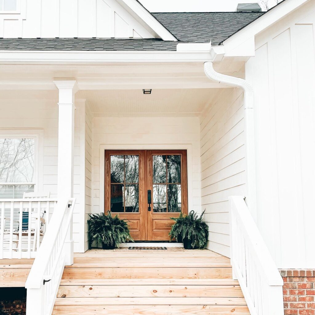 Welcoming Porch with Cascading Ferns
